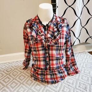 Ruffle neck blouse.